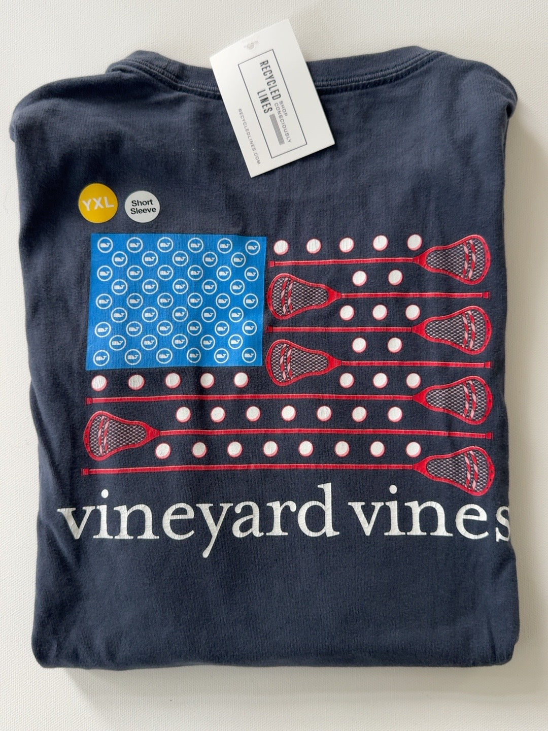 Original photo of navy Vineyard Vines boys XL lacrosse flag graphic short sleeve tee