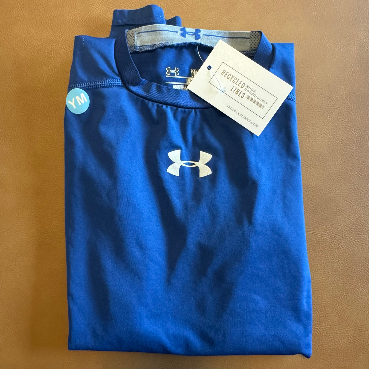 Under Armour blue boys medium long sleeve athletic tee folded front view