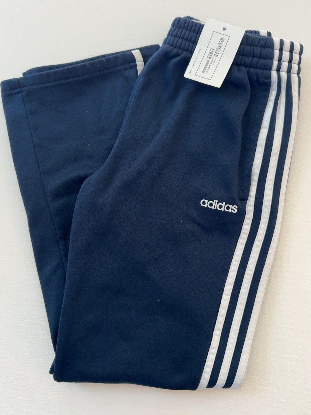 Adidas navy boys size L (14/16) sweatpants with white side stripes