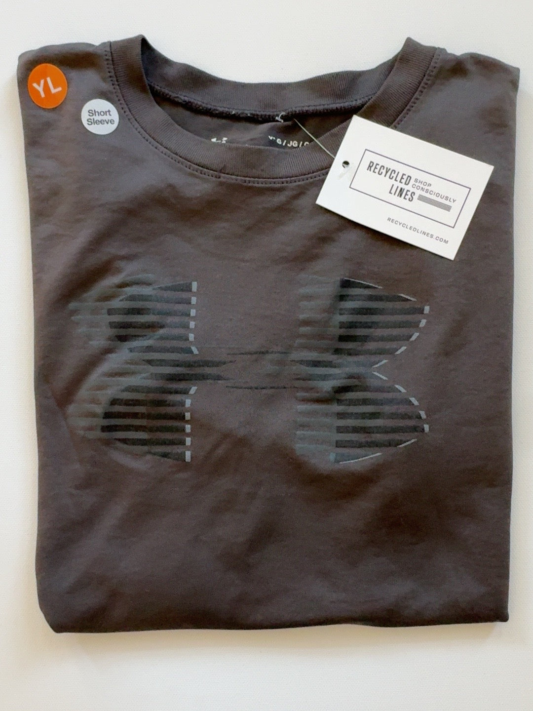 Under Armour charcoal short sleeve tee boys size L folded front view