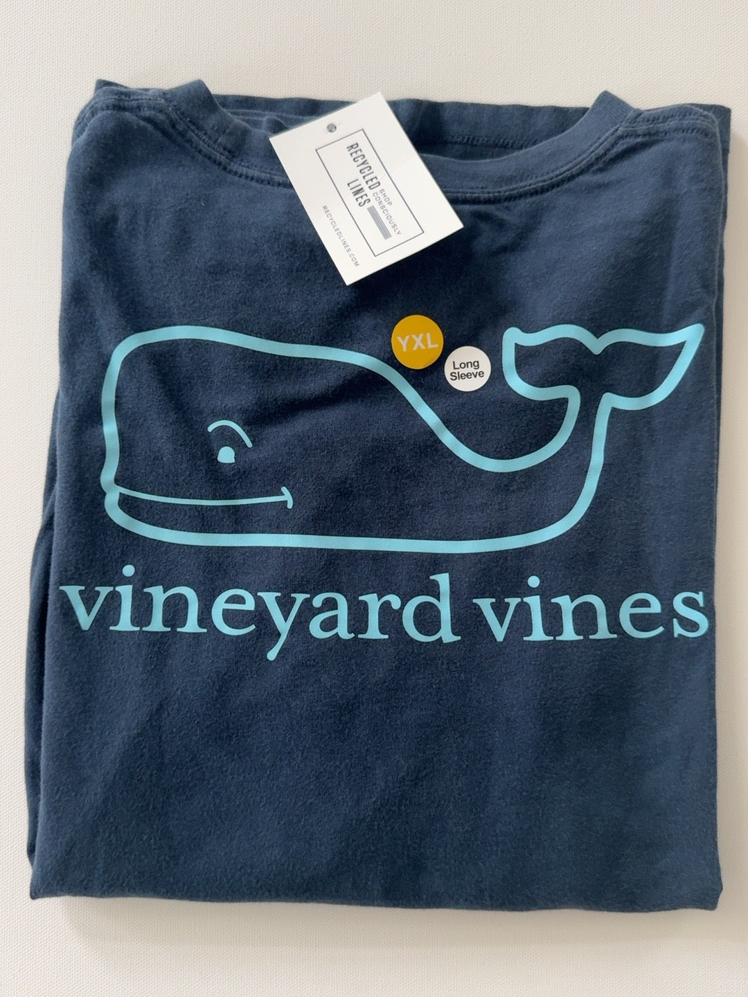 Original product photo of navy Vineyard Vines boys XL 18 long sleeve whale tee with turquoise whale outline and lettering