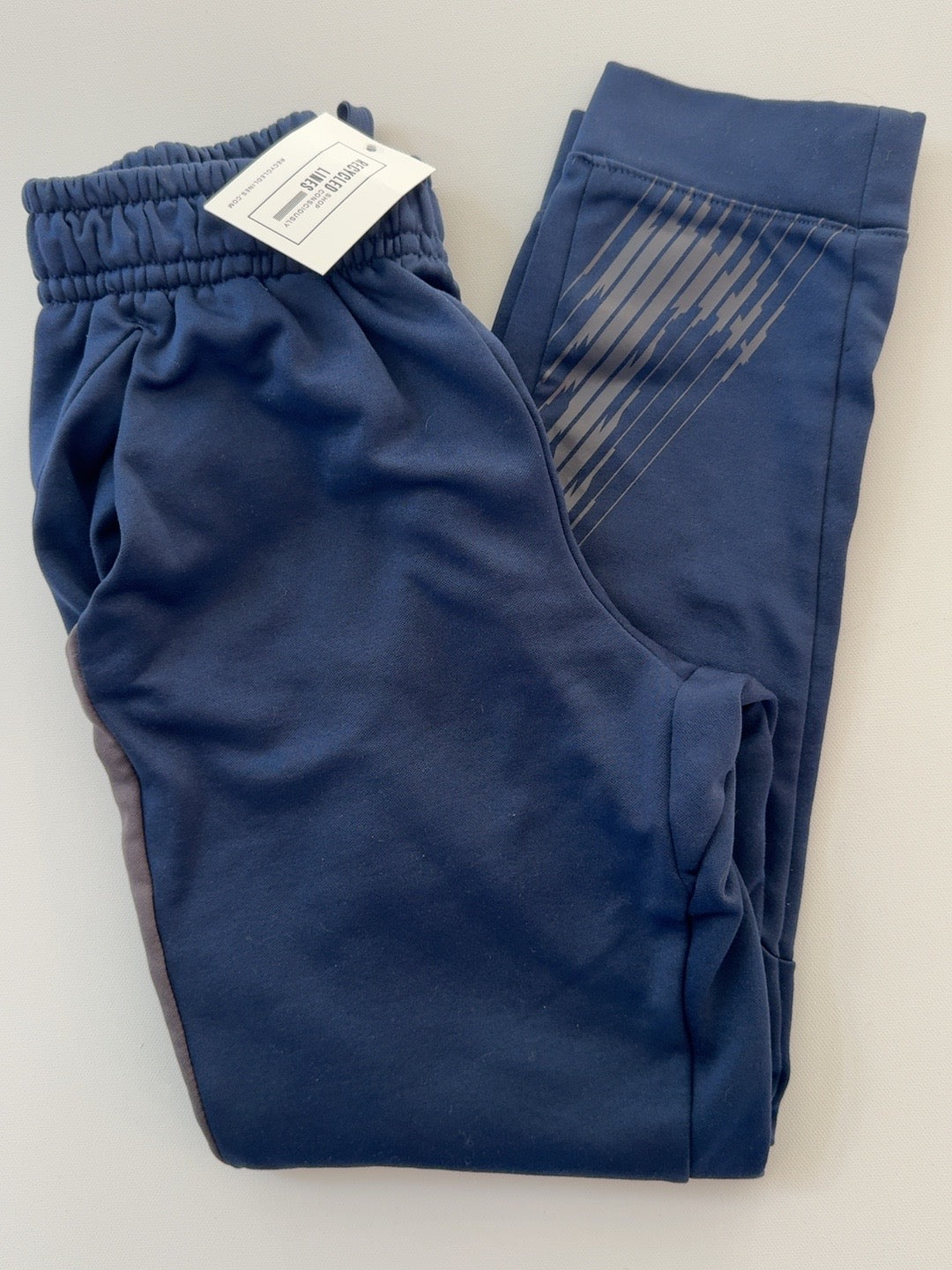 Nike navy boys size L sweatpants with patterned side panel