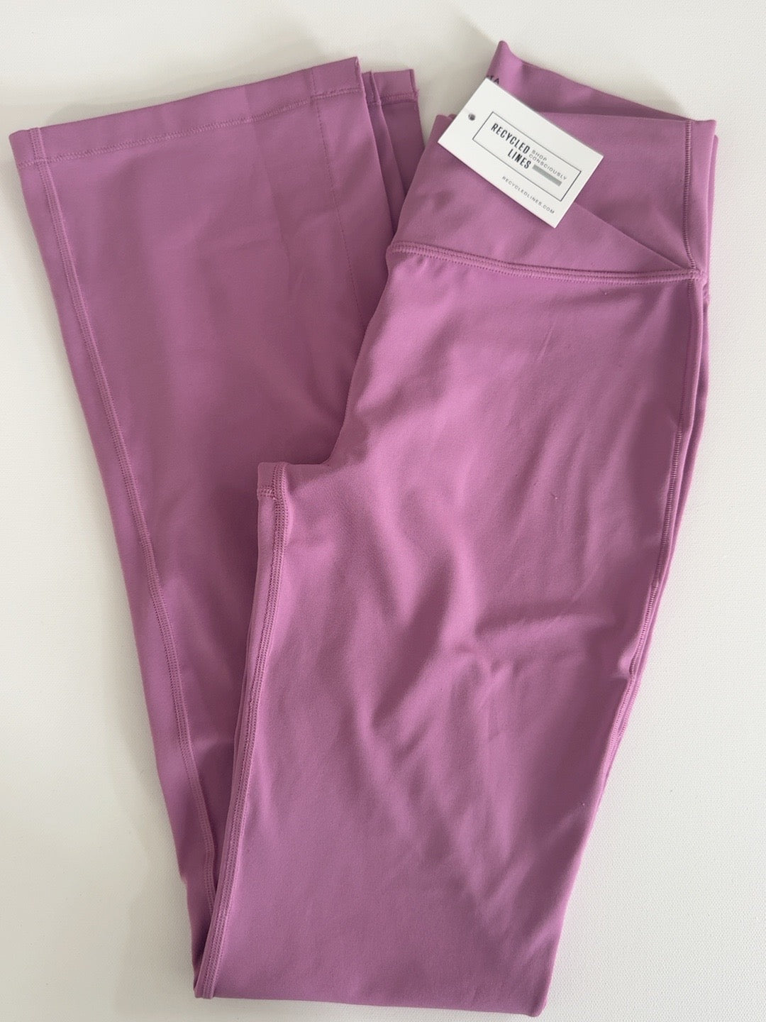 Athleta Girl plum purple flare leggings, girls size XL (14)